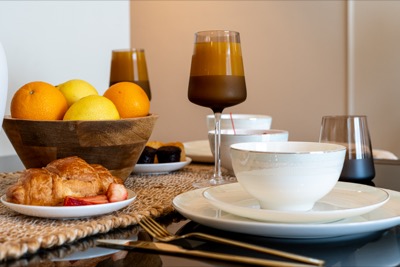 Breakfast styling detail with fresh fruit and pastries